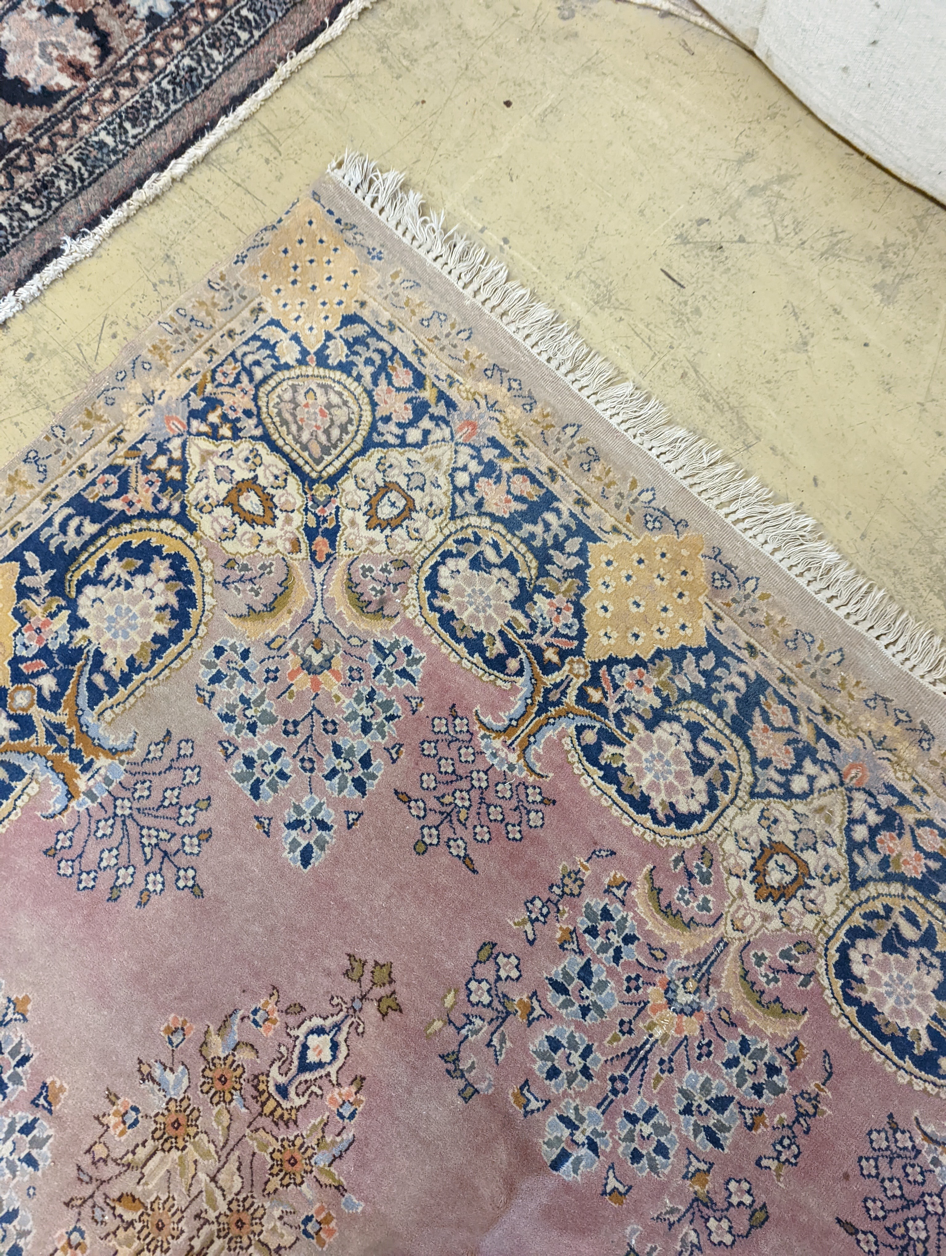 A North West Persian design peach ground carpet, 250 x 170cm